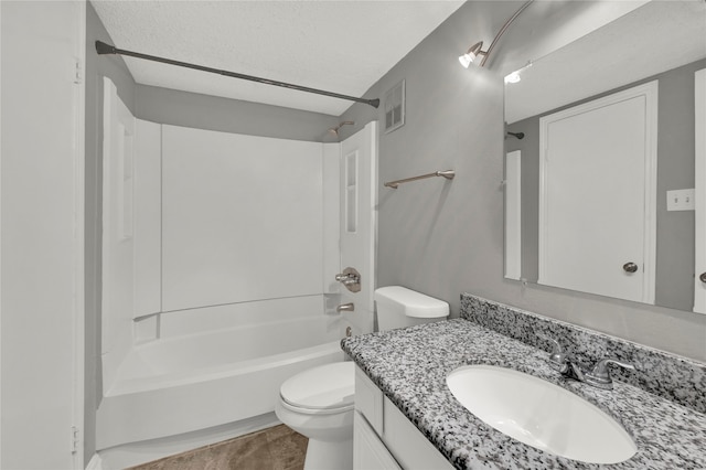 full bathroom with shower / bathing tub combination, toilet, tile patterned floors, and vanity