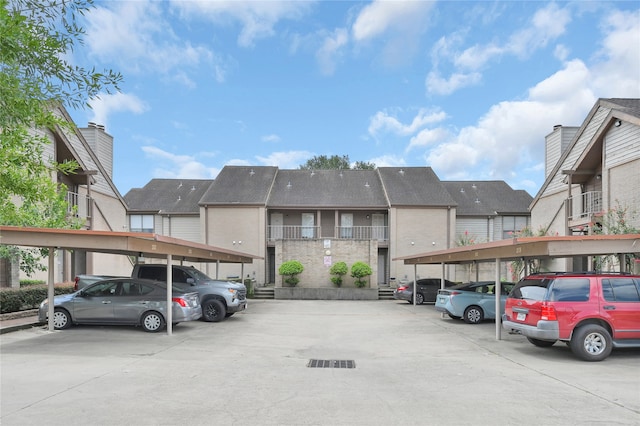 view of parking with a carport