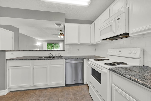 kitchen with ceiling fan, white cabinets, sink, a textured ceiling, and white appliances