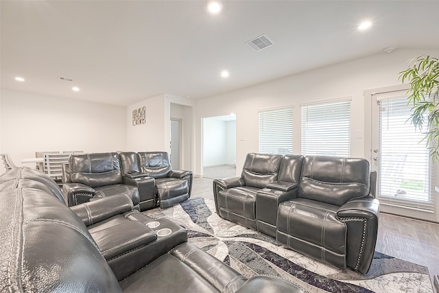 home theater featuring light wood-type flooring