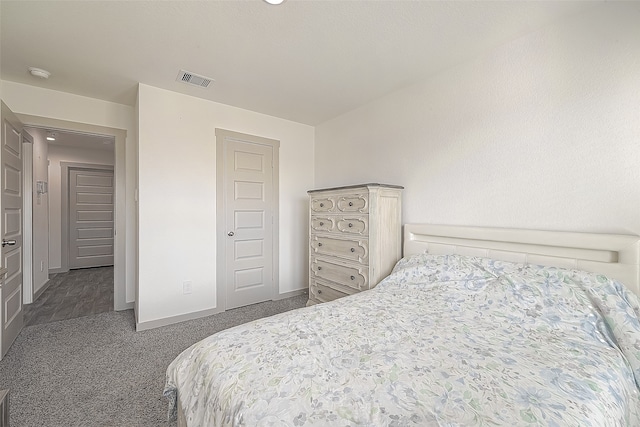 bedroom with a closet and carpet floors