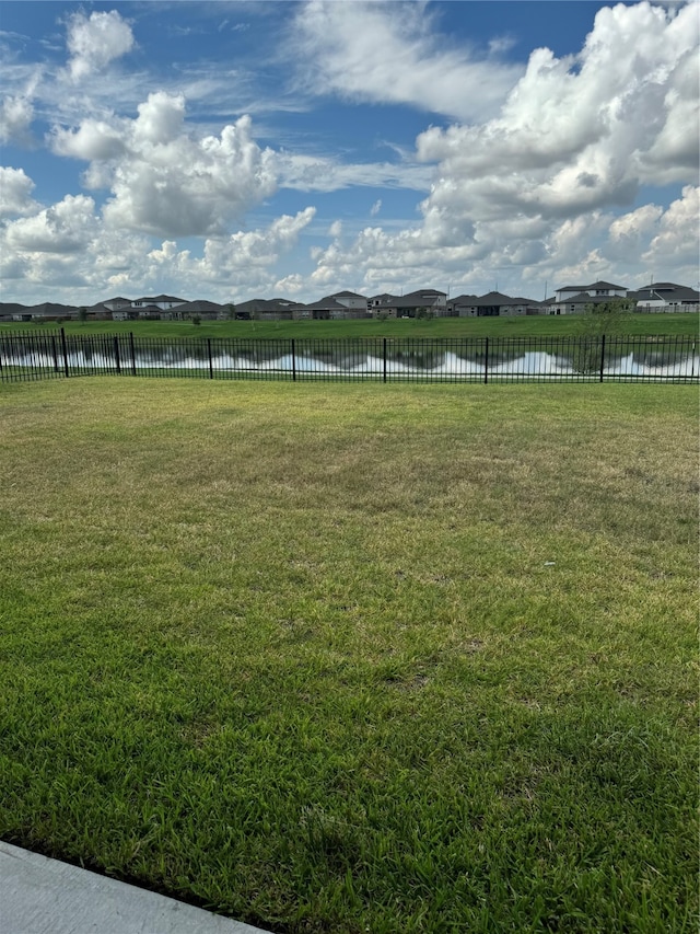 view of yard with a water view