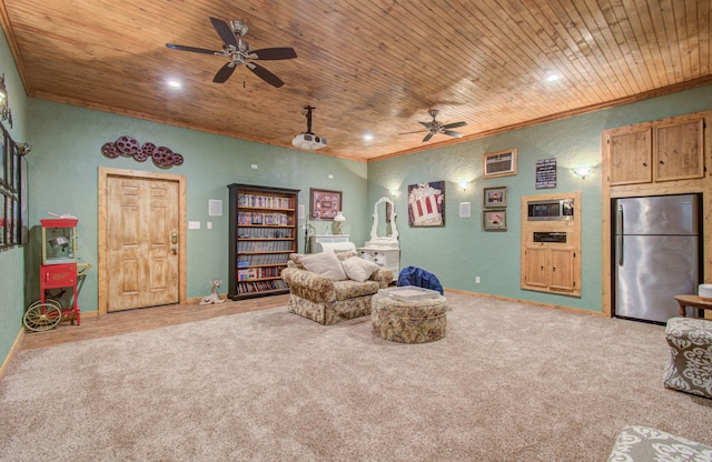 sitting room featuring light carpet, ceiling fan, and wooden ceiling