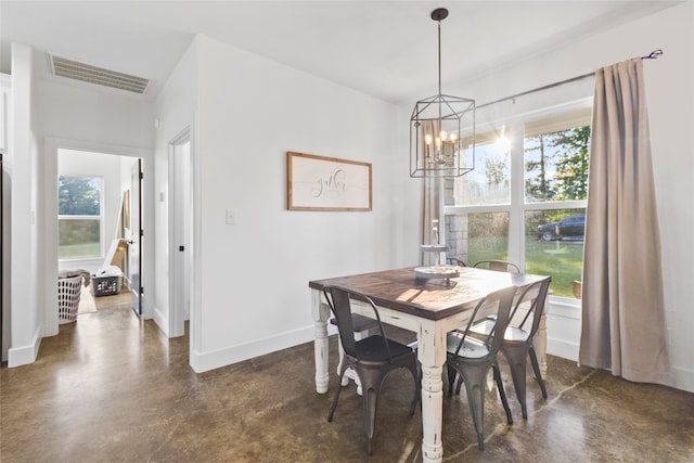 dining room featuring an inviting chandelier