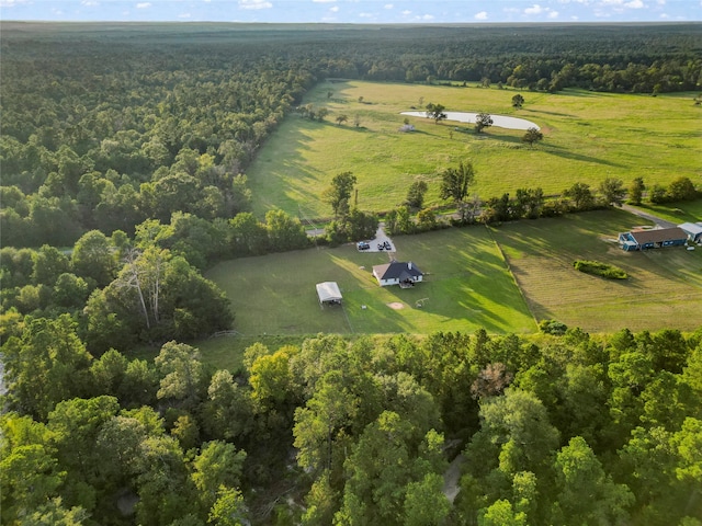 birds eye view of property featuring a rural view