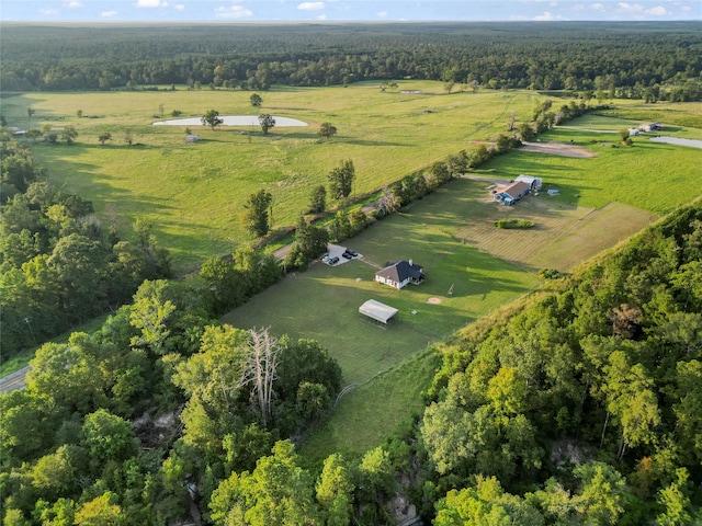 birds eye view of property featuring a rural view