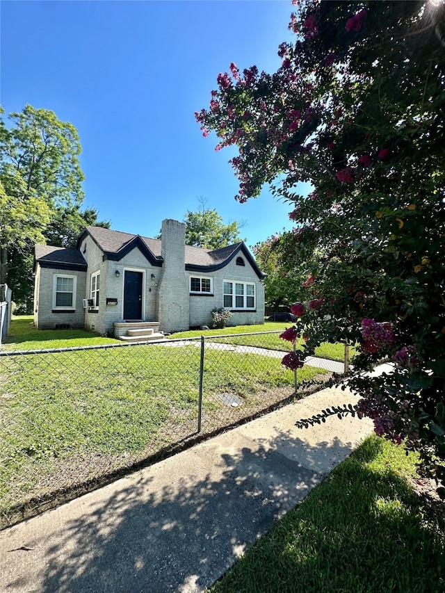 view of front of home with a front yard