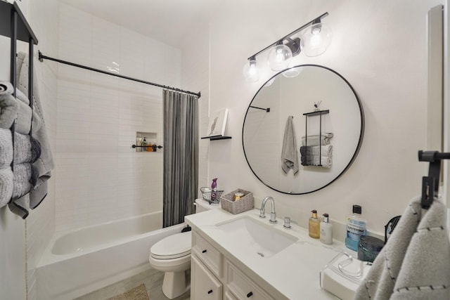 bathroom with shower / bath combo, vanity, and toilet