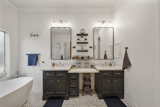 full bath featuring a stall shower, crown molding, a freestanding bath, and vanity