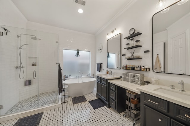 bathroom featuring tile patterned flooring, independent shower and bath, vanity, and ornamental molding