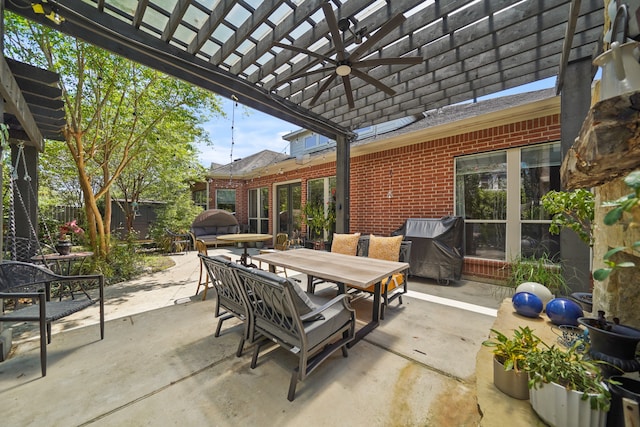 view of patio / terrace featuring ceiling fan and a pergola