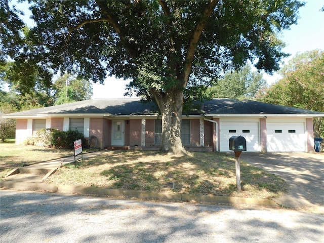 ranch-style house featuring a garage