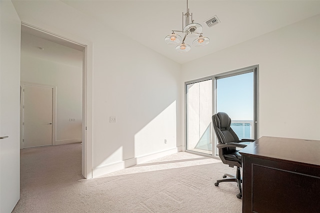 office space featuring light colored carpet and an inviting chandelier