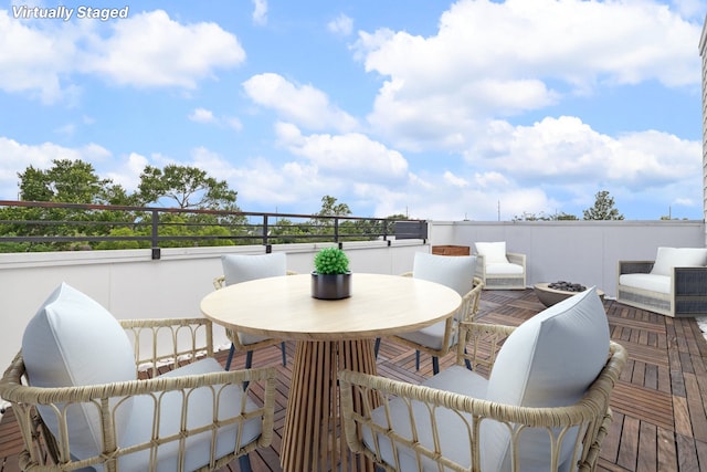 view of patio / terrace with a balcony