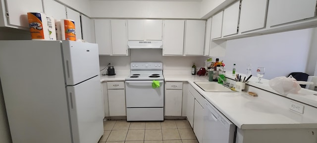 kitchen featuring sink, white cabinetry, light tile patterned flooring, and white appliances