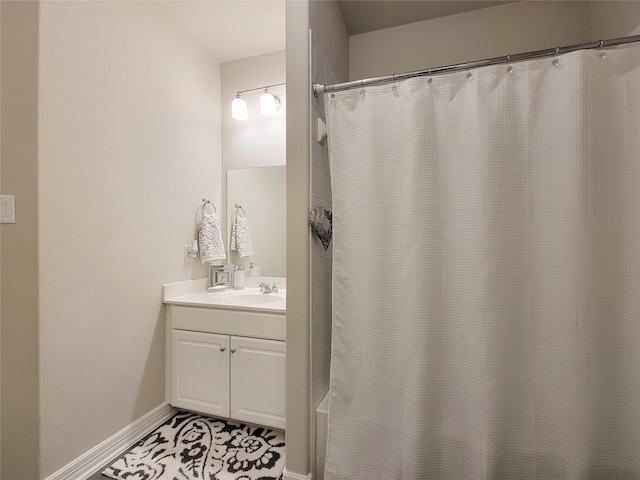 bathroom featuring shower with separate bathtub, vanity, and tile patterned floors