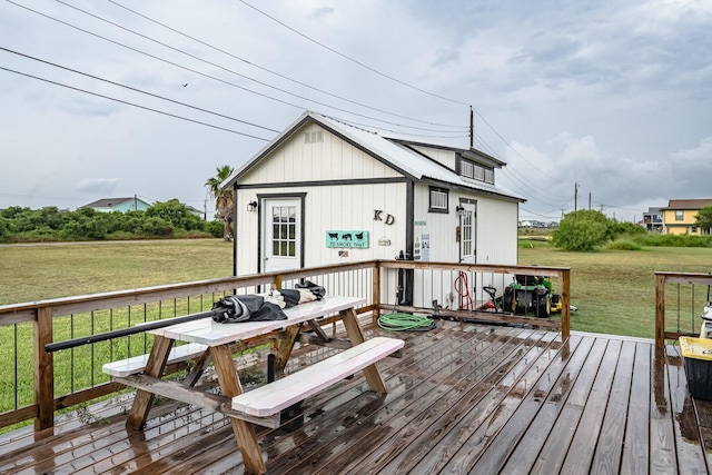 deck featuring a lawn