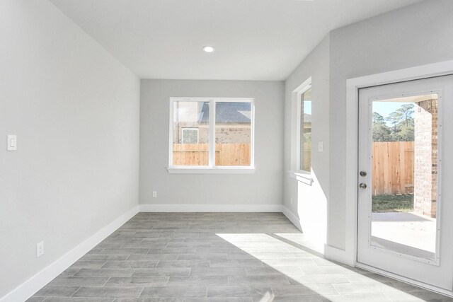 doorway with light hardwood / wood-style floors