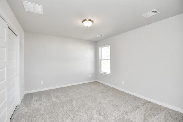 unfurnished room featuring carpet floors