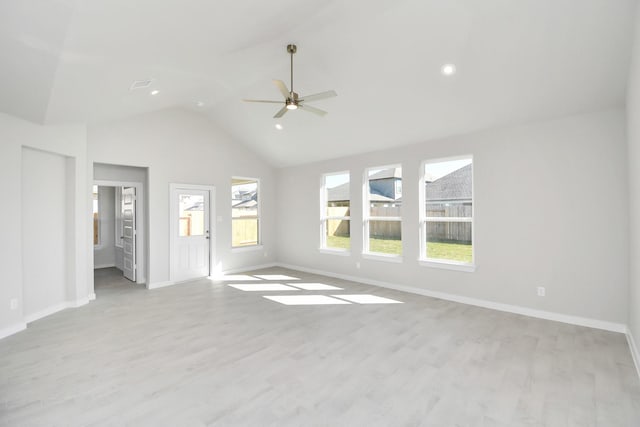 unfurnished living room featuring ceiling fan, light wood-type flooring, and lofted ceiling