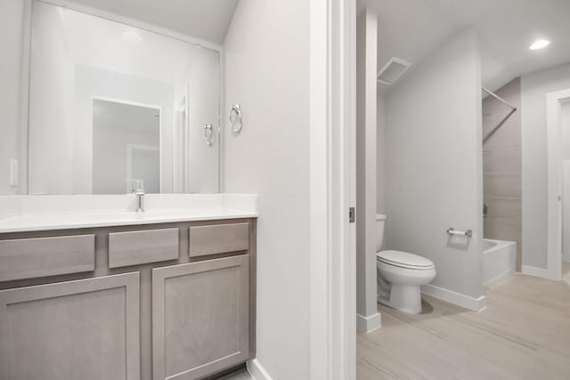 full bathroom featuring vanity, toilet, and shower / tub combination