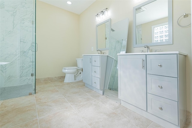 full bath with tile patterned flooring, a marble finish shower, vanity, and toilet