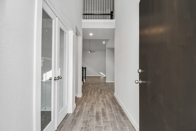 hallway with light wood-type flooring