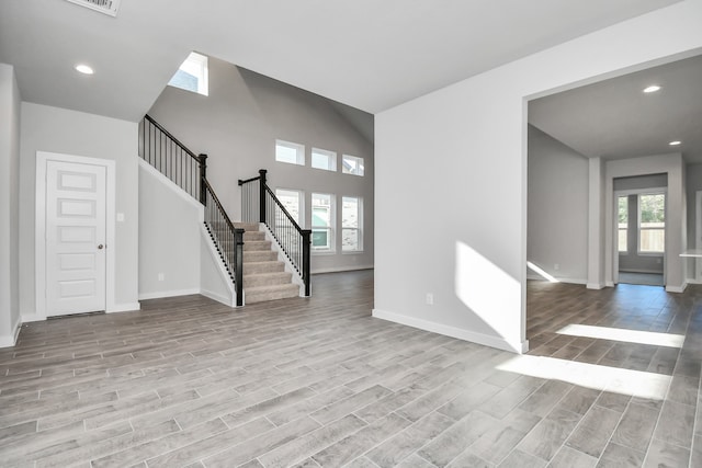 interior space featuring light hardwood / wood-style flooring and a healthy amount of sunlight