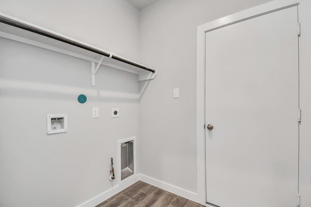 clothes washing area featuring washer hookup, electric dryer hookup, hookup for a gas dryer, and dark hardwood / wood-style floors