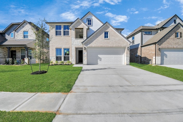 view of front facade featuring a garage and a front lawn