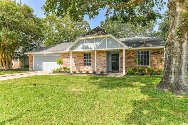 view of front facade with a front yard and a garage