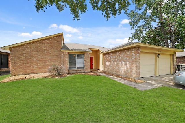 ranch-style house featuring a garage and a front yard