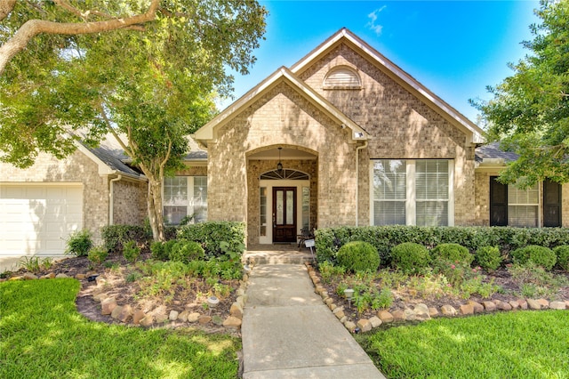 doorway to property featuring a garage