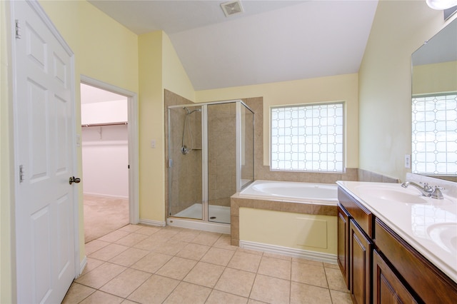 bathroom featuring a healthy amount of sunlight, separate shower and tub, vanity, and tile patterned floors