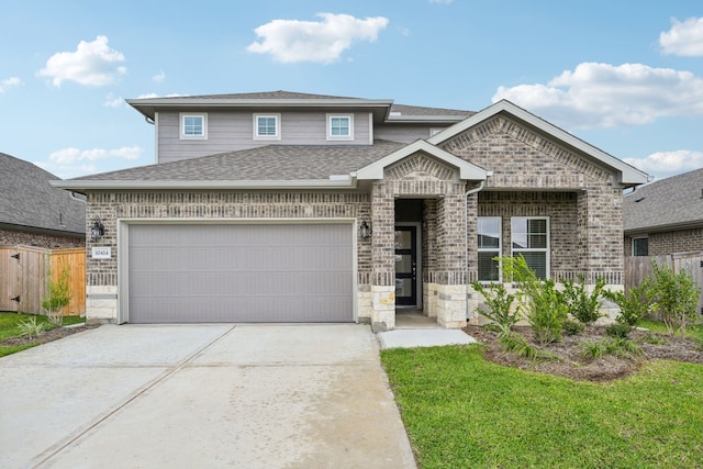 view of front of property featuring a garage