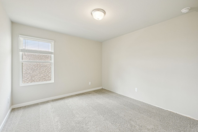 spare room with carpet floors