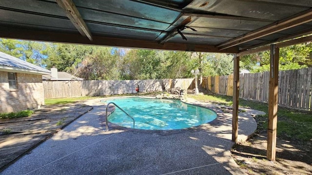 view of pool featuring ceiling fan and a patio area