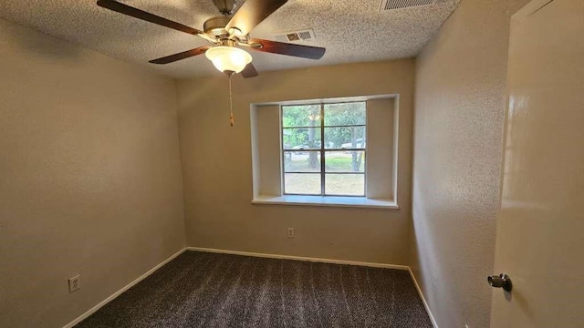 unfurnished room featuring a textured ceiling, baseboards, ceiling fan, and carpet floors