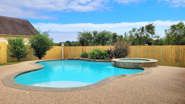 view of pool featuring an in ground hot tub and a patio