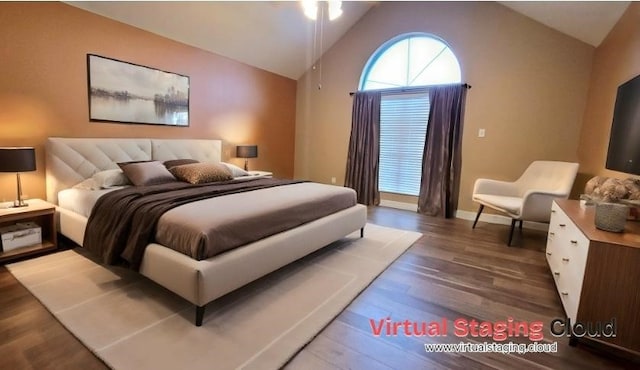 bedroom with dark wood-type flooring and vaulted ceiling