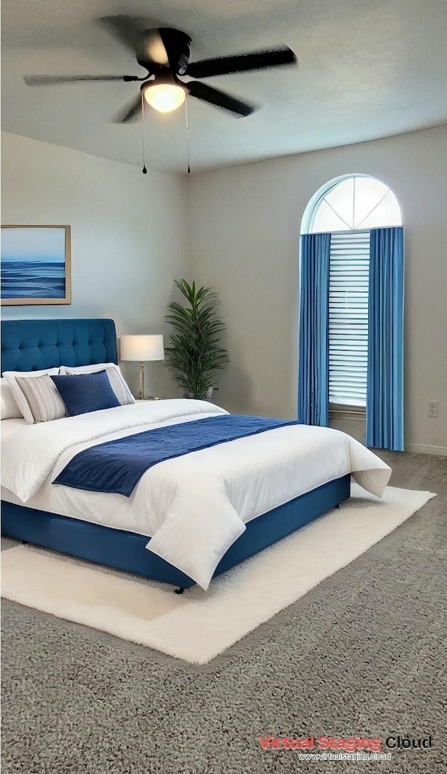 bedroom featuring carpet flooring and ceiling fan