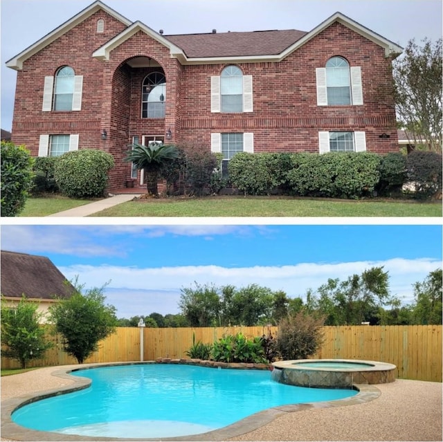 view of swimming pool with an in ground hot tub