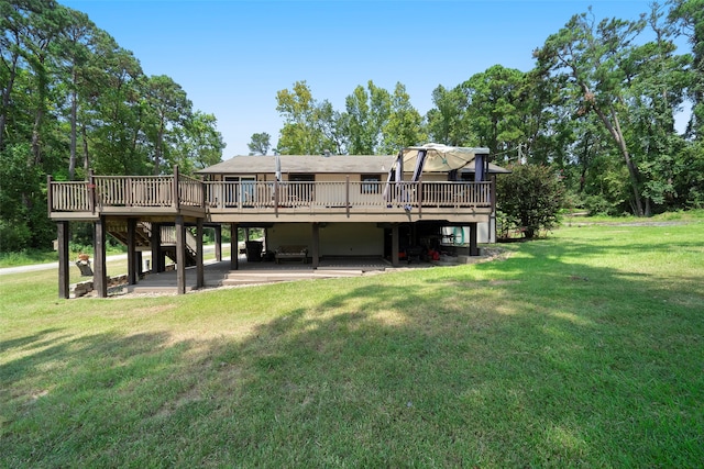 back of house with a wooden deck and a yard