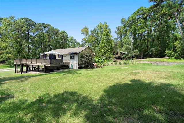 view of yard featuring a deck