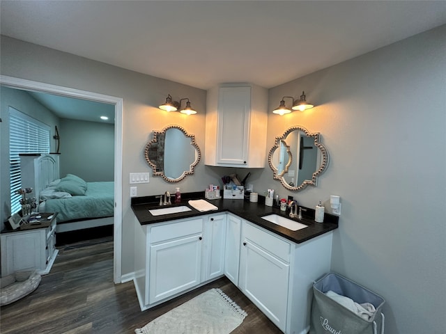 bathroom featuring hardwood / wood-style floors and vanity