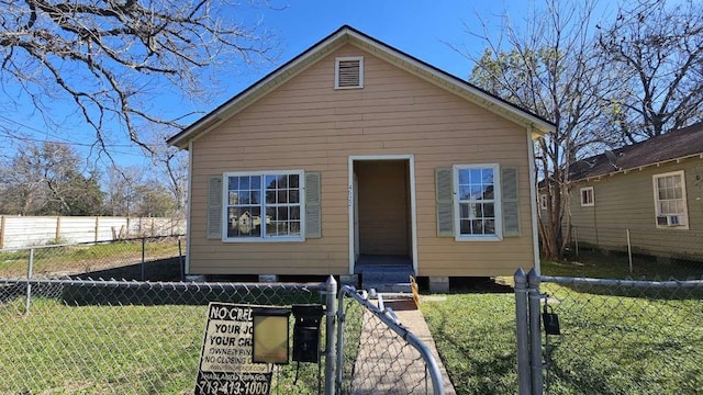 bungalow with a front lawn