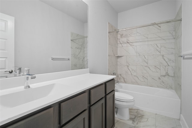 full bathroom featuring tiled shower / bath, toilet, and vanity