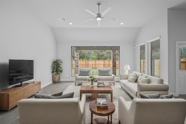 living room with high vaulted ceiling and ceiling fan