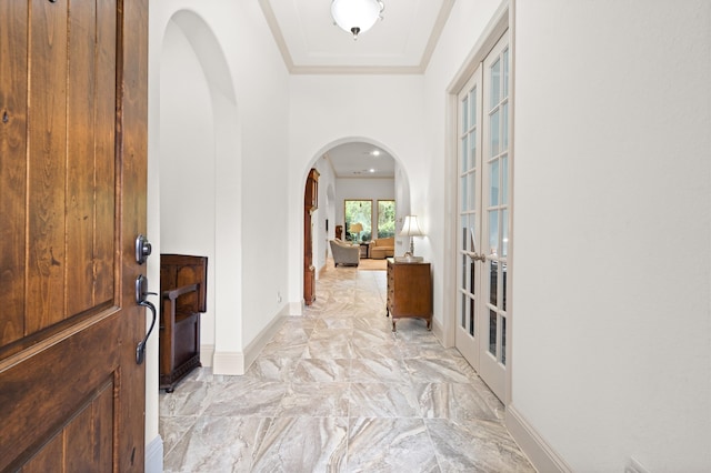 hall featuring light tile patterned flooring