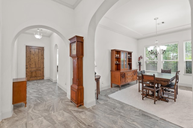 dining room with light tile patterned flooring and a chandelier